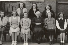 Mrs Kirk's Class 1949 - Joan Calvert holding board