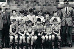 Junior School Football Team with Mr Willans and Mr Lister