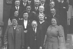 Holiday party outside their guest house, no date.