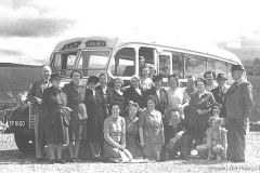 Holiday party on a coach trip, no date.