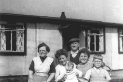 The Bean family outside their prefab, c.1960: Council Housing