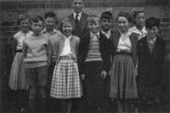 11Plus Winners 1957 - From left to right: Carol Fleetham, Wilf Warnes, Wilf Morgan, Vera Pattison, Mr Wright, Les Jones, Derek Ayre, Mary Foster, Margaret Poole, Billy Burrell
