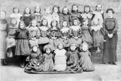 Scott, Mrs Middle Row 3rd Right 1898