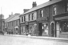 Front Street:(R-L) Hedley's Butchers, Meadow Dairy, Scott's Drapers, Oswald's, Newman's