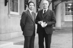 Mr Harris with his son Malcolm being presented MBE at Buck Palace